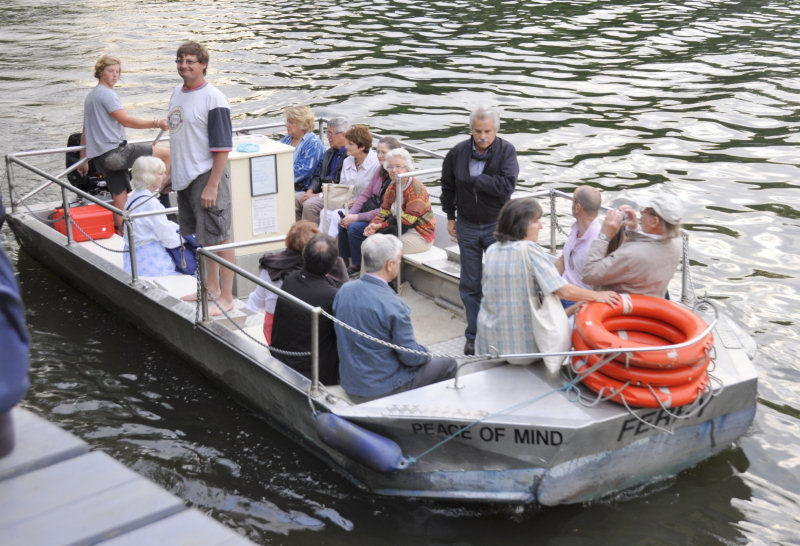 Hammerton's Ferry: the Armstrong designed and built Peace of Mind crosses the Thames between Marble Hill House and Ham House